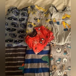 6 pairs of 2T footed pajamas.